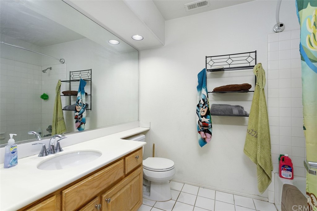 3660 Via Bernardo Oceanside, CA 92056 - Photo 24 of 34 a bathroom with a sink toilet and shower