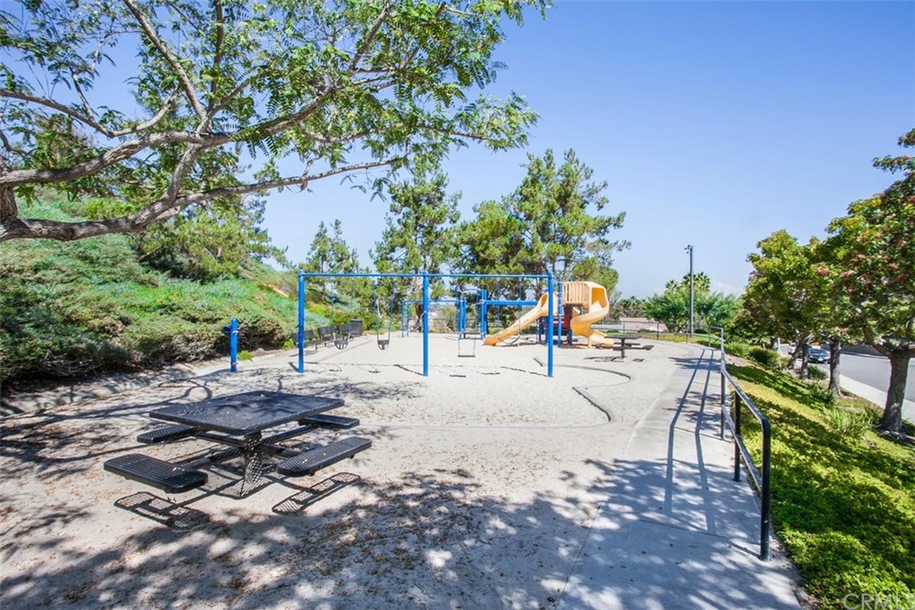 3660 Via Bernardo Oceanside, CA 92056 - Photo 33 of 34 a row of trees and houses on the side of the road