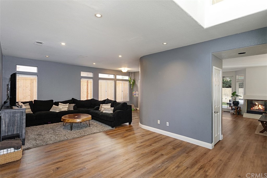 3660 Via Bernardo Oceanside, CA 92056 - Photo 4 of 34 a living room with furniture and wooden floor