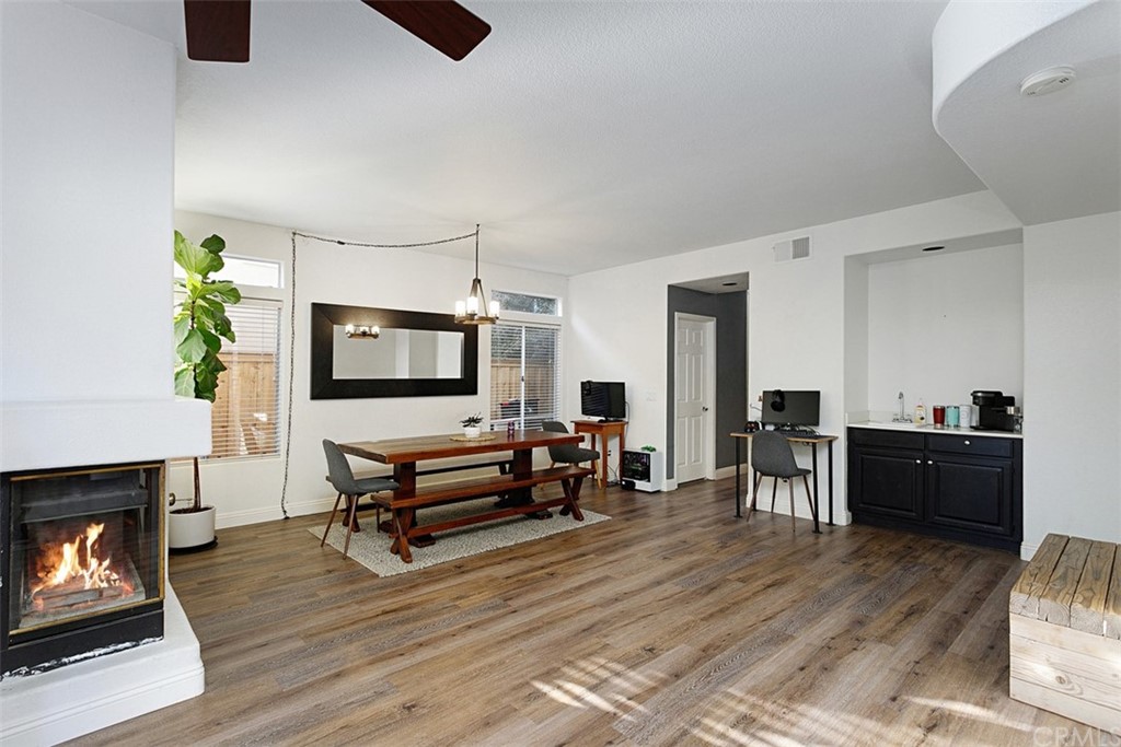 3660 Via Bernardo Oceanside, CA 92056 - Photo 9 of 34 a living room with furniture and a fireplace