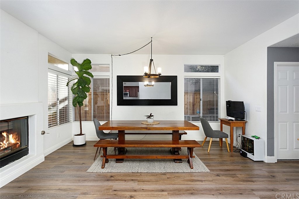 3660 Via Bernardo Oceanside, CA 92056 - Photo 10 of 34 a living room with furniture a flat screen tv and a fireplace