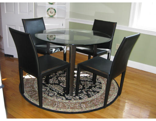 34 White Pine Road Newton, MA 02464 - Photo 8 of 15 a view of a dining room with furniture and wooden floor