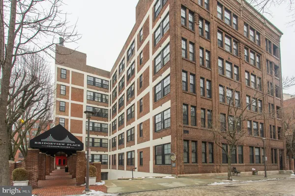 a view of a building and a street