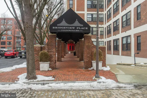 a view of front door with outdoor seating