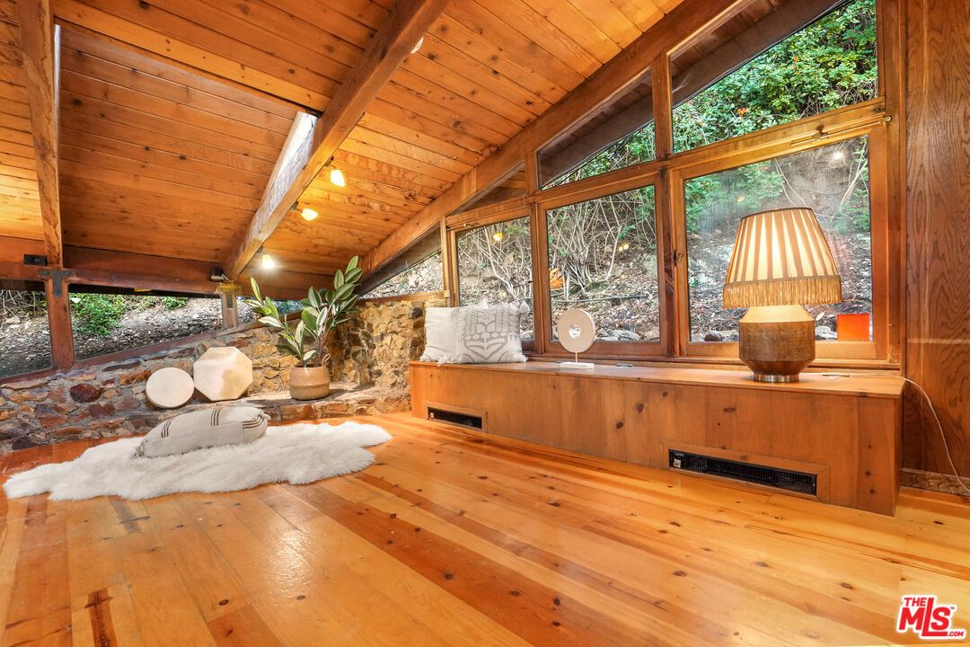 20881 Waveview Drive Topanga, CA 90290 - Photo 13 of 54 a view of a bathroom with a tub and window