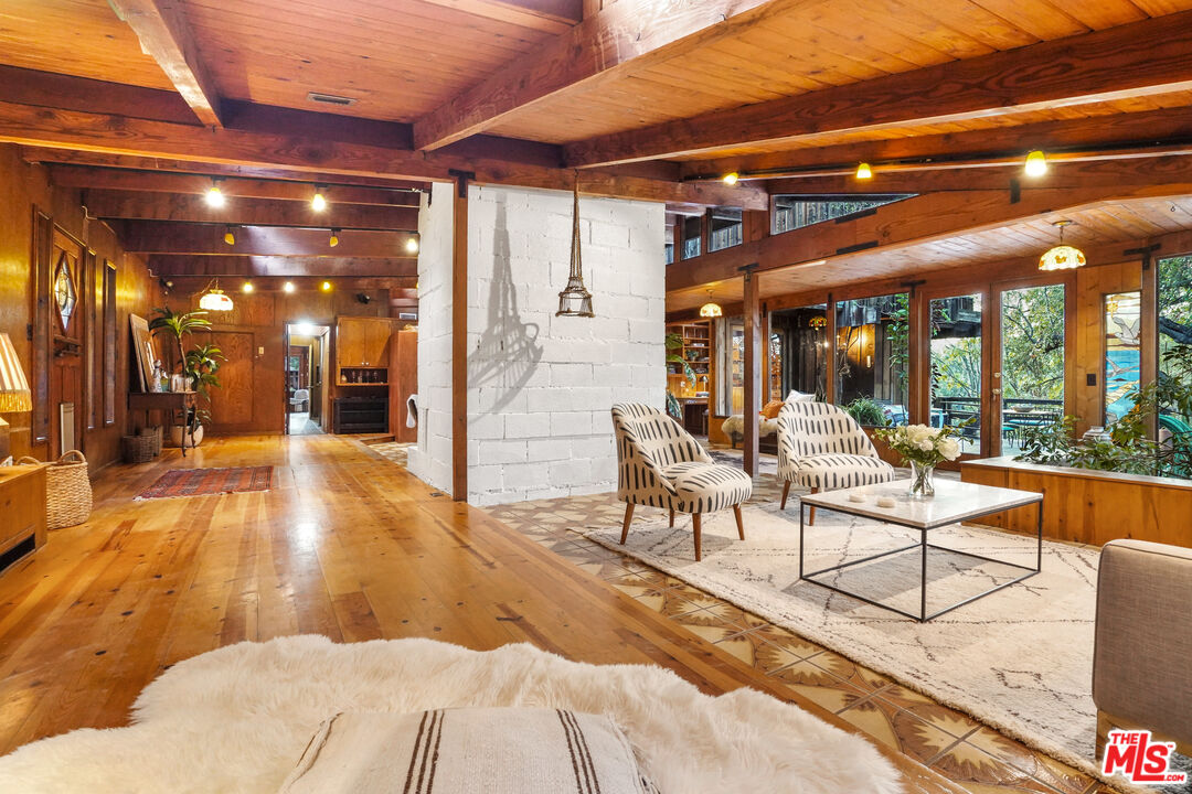 20881 Waveview Drive Topanga, CA 90290 - Photo 17 of 54 a view of a patio with a table and chairs