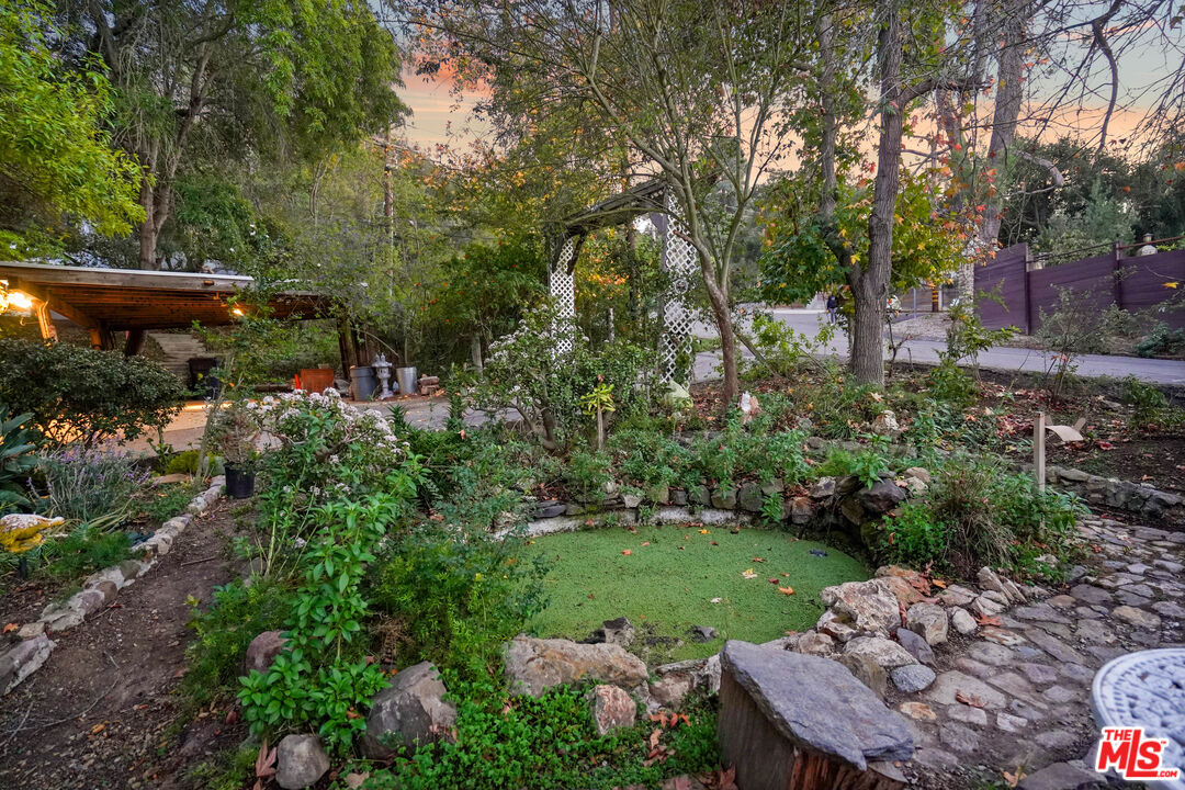 20881 Waveview Drive Topanga, CA 90290 - Photo 41 of 54 a view of a backyard with sitting area