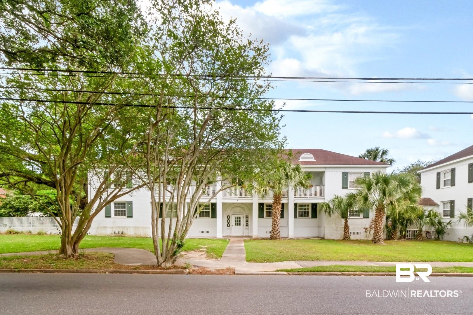 214 Upham Street, Unit 3D Mobile, AL 36607 - Photo 32 of 34 View of front of property featuring a front lawn, french doors, and covered porch