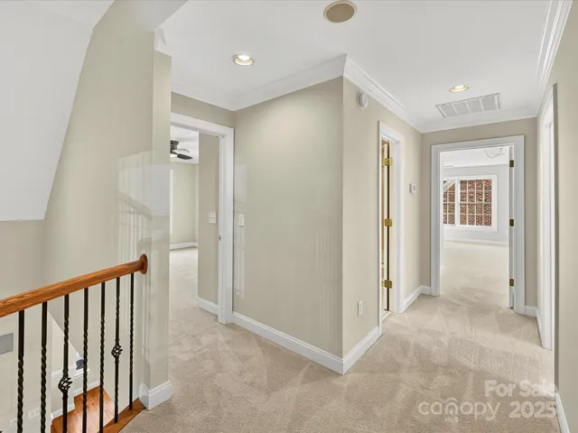 a view of a hallway with closet area