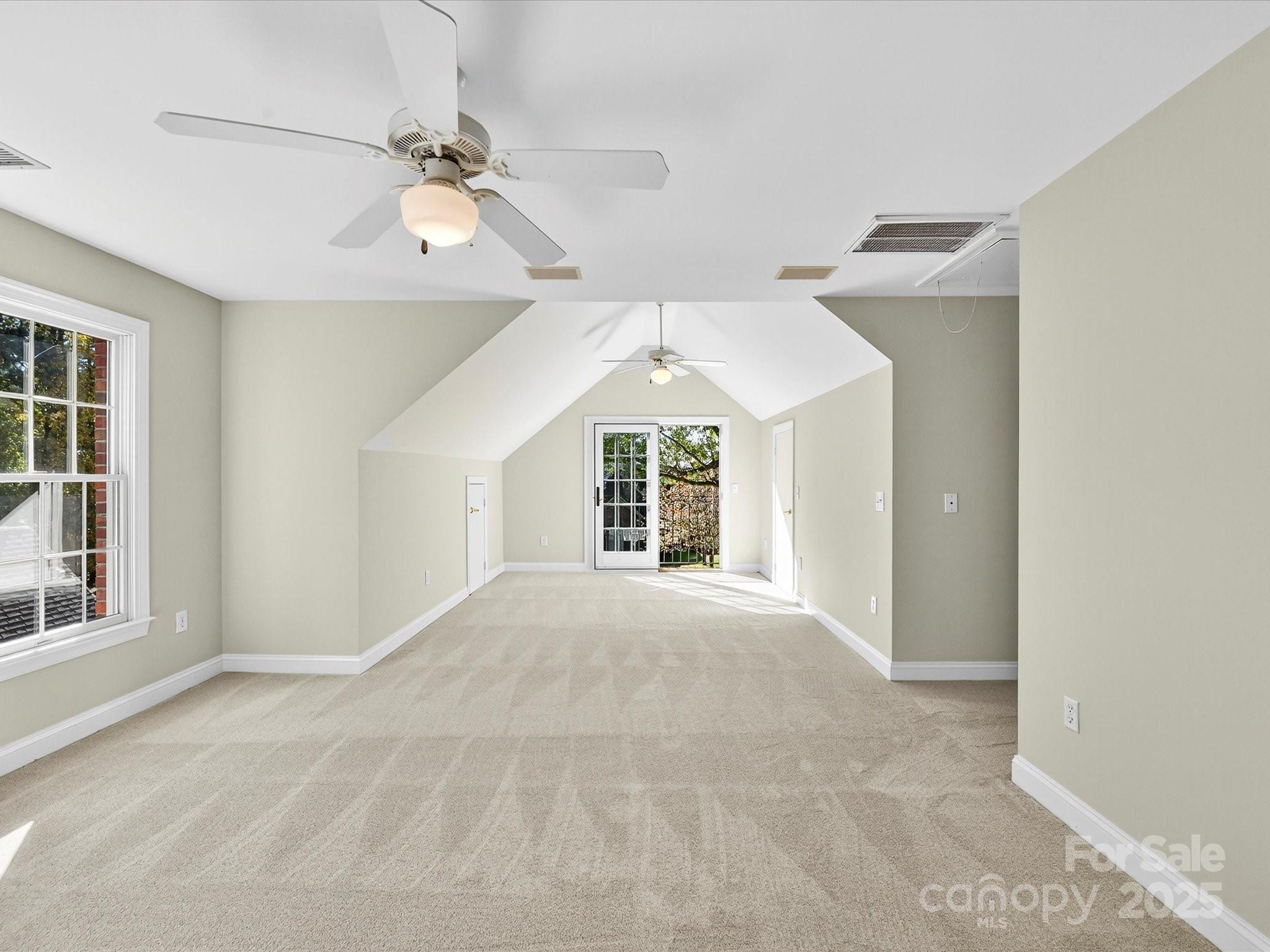 21410 Pinecrest Place Cornelius, NC 28031 - Photo 34 of 43 a view of an empty room with a window