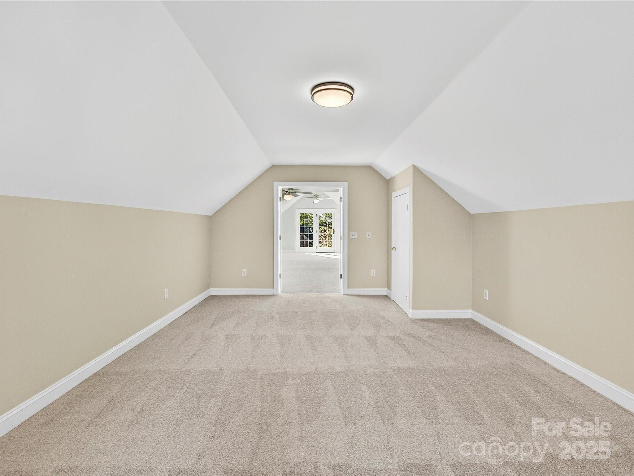21410 Pinecrest Place Cornelius, NC 28031 - Photo 37 of 43 an empty room with windows and closet