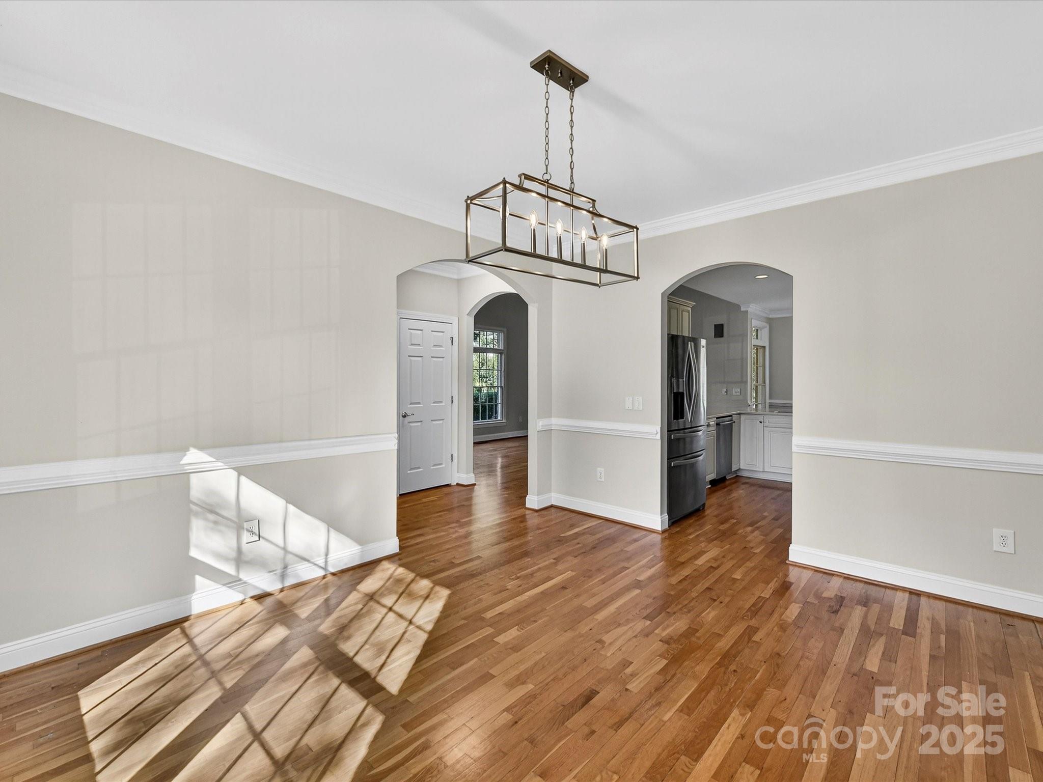 21410 Pinecrest Place Cornelius, NC 28031 - Photo 7 of 43 a view of livingroom with furniture and wooden floor