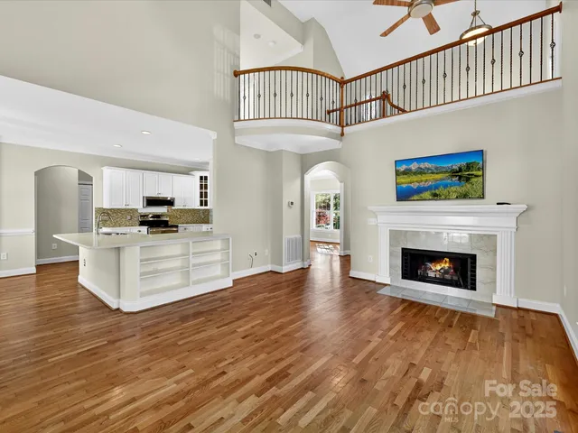a view of kitchen with furniture and a fireplace