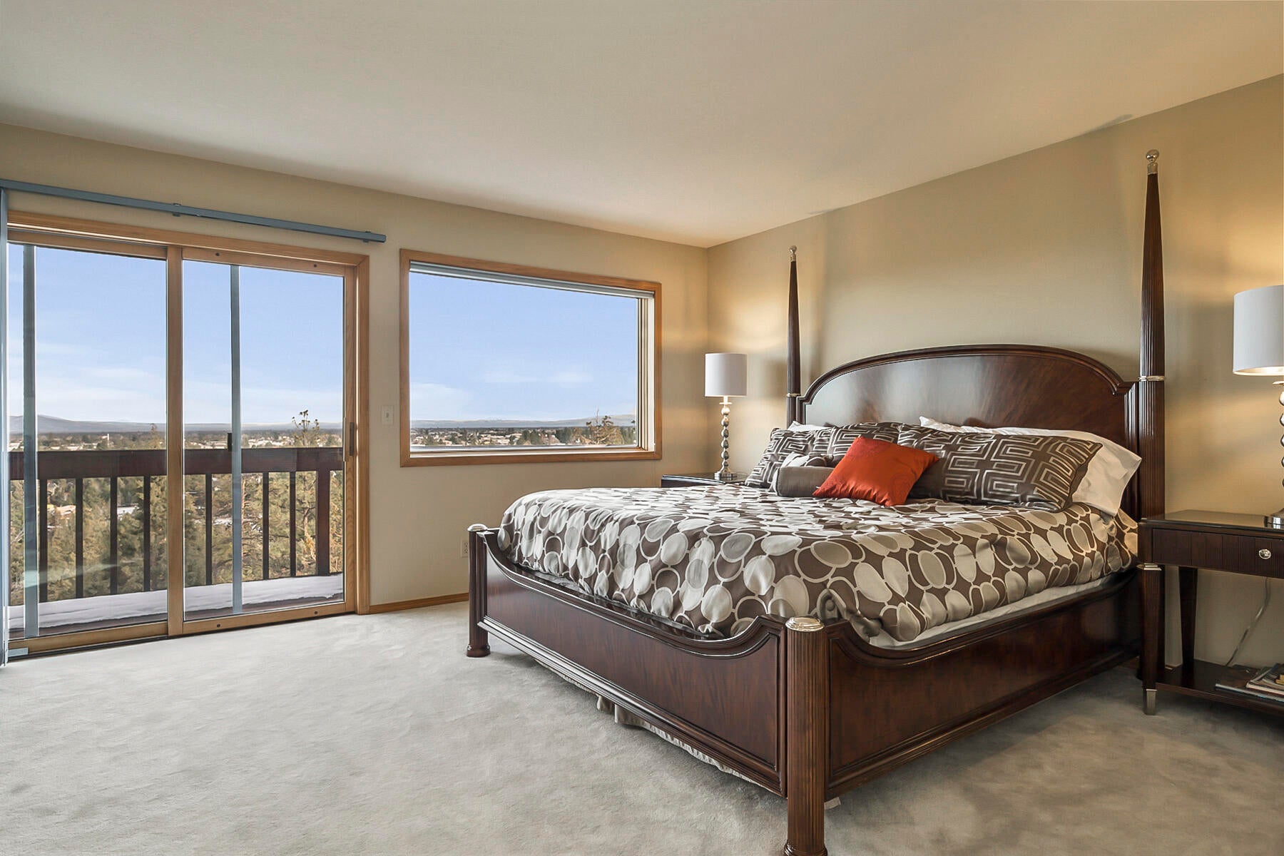 3808 Northwest Summerfield Road Bend, OR 97703 - Photo 28 of 38 Open primary suite with beautiful easterly views from the multitude of wood trimmed windows.
