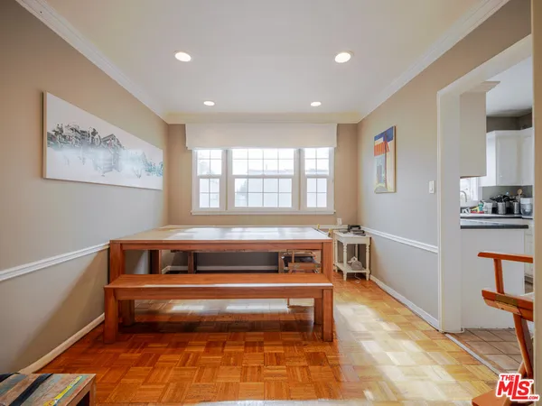 a living room with a bed and a couch