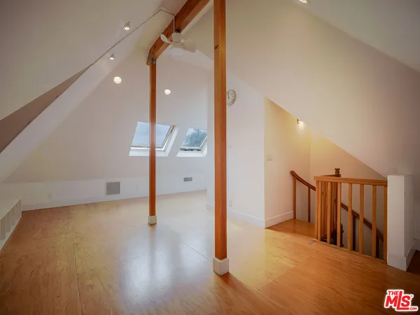 a view of a living room with a large window