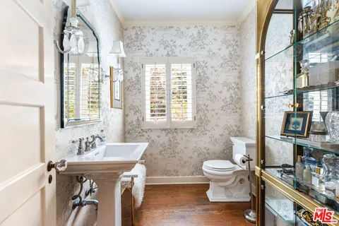 a bathroom with a sink and a toilet
