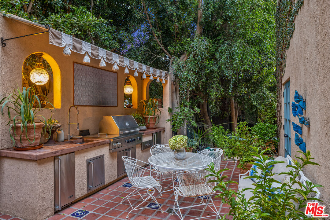 175 West Channel Road Santa Monica, CA 90402 - Photo 26 of 27 a view of two chairs and table in a patio