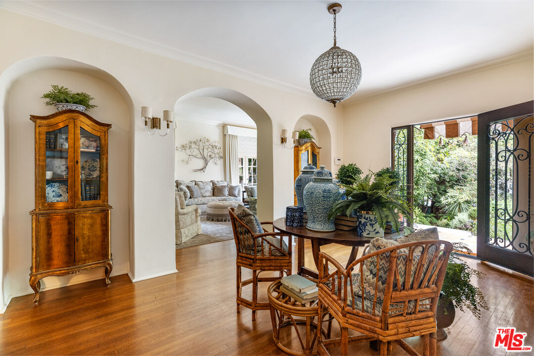 175 West Channel Road Santa Monica, CA 90402 - Photo 5 of 27 a view of a dining room with furniture window and wooden floor