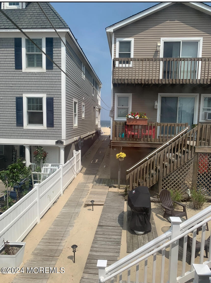 66 1st Avenue Manasquan, NJ 08736 - Photo 12 of 14 a view of a house with roof deck