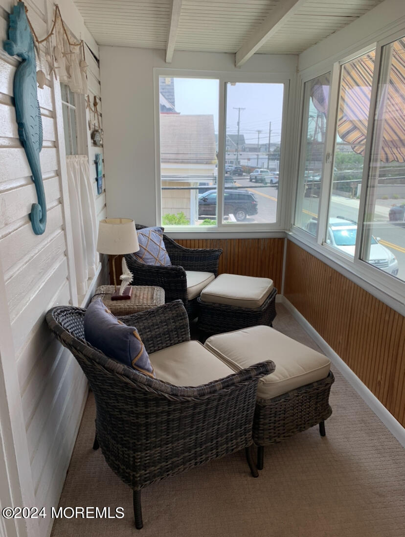 66 1st Avenue Manasquan, NJ 08736 - Photo 2 of 14 a living room with furniture and a large window