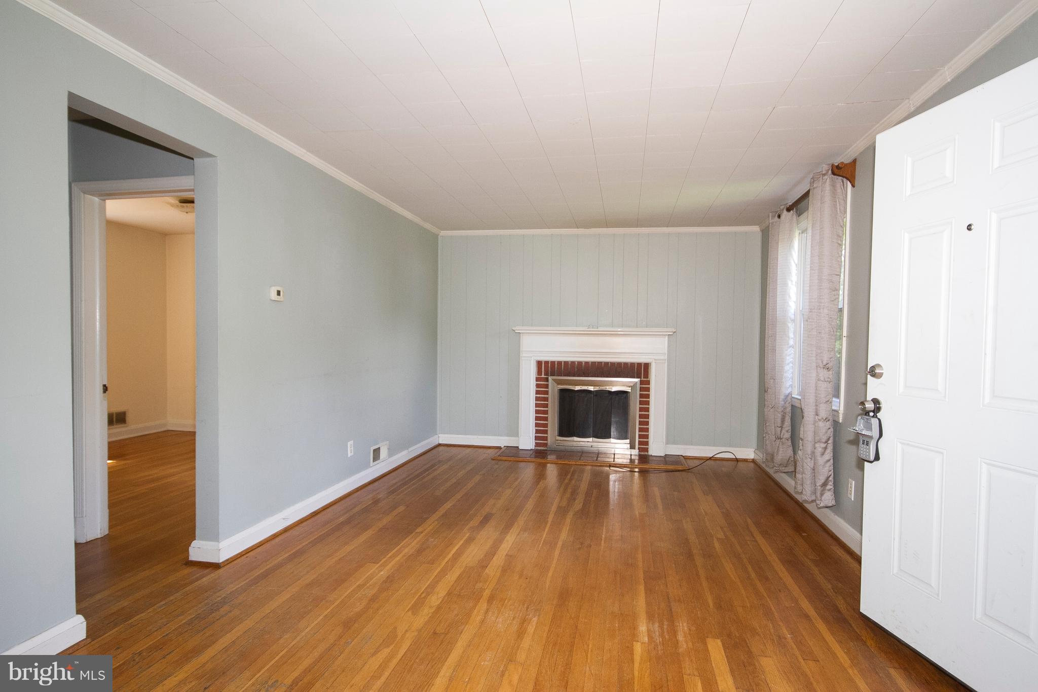 33 Cedar Knoll Road Cockeysville, MD 21030 - Photo 2 of 17 Living Room with Wood Burning Fireplace
