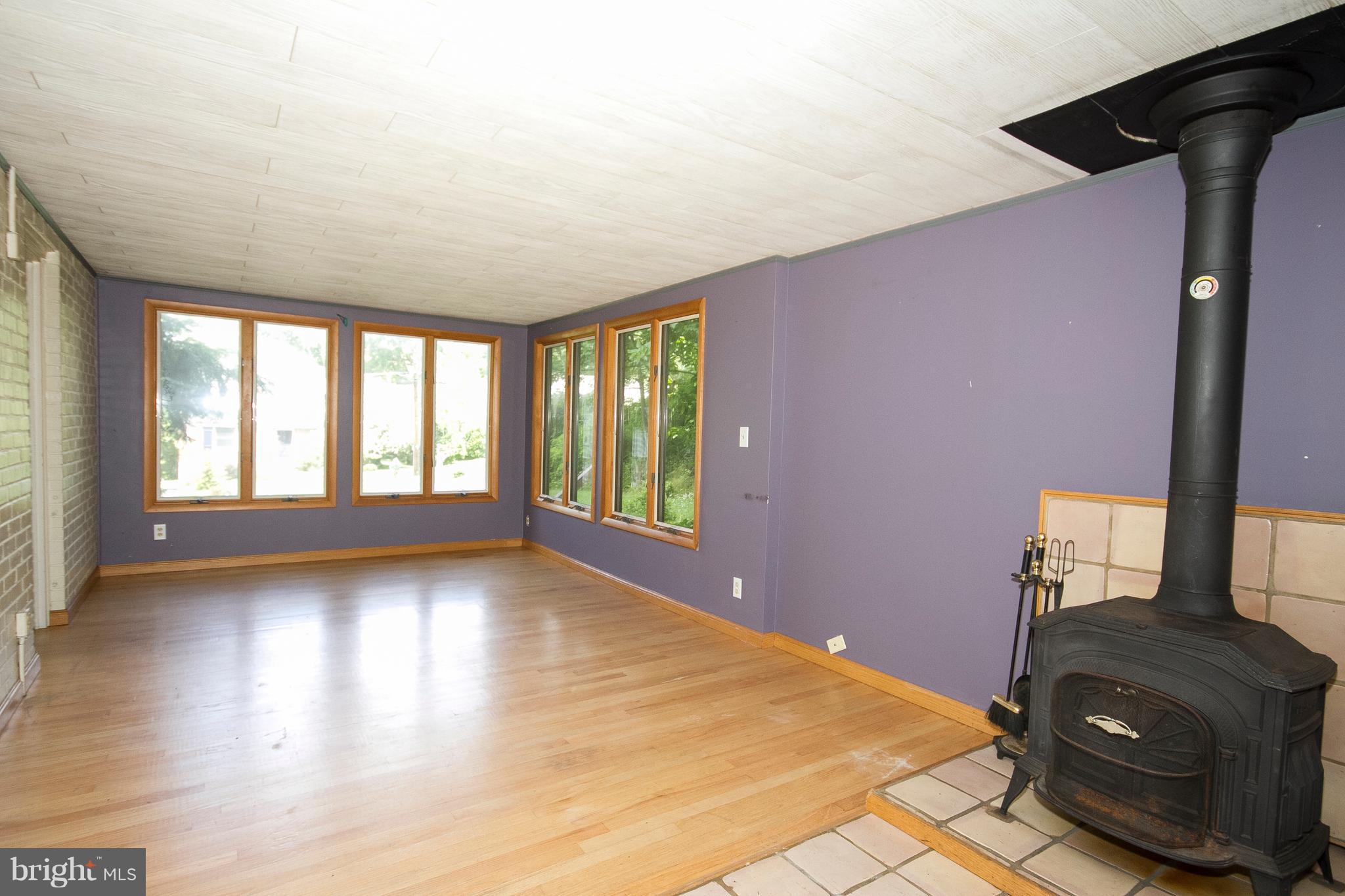 33 Cedar Knoll Road Cockeysville, MD 21030 - Photo 7 of 17 First Floor Family Room with Woodstove