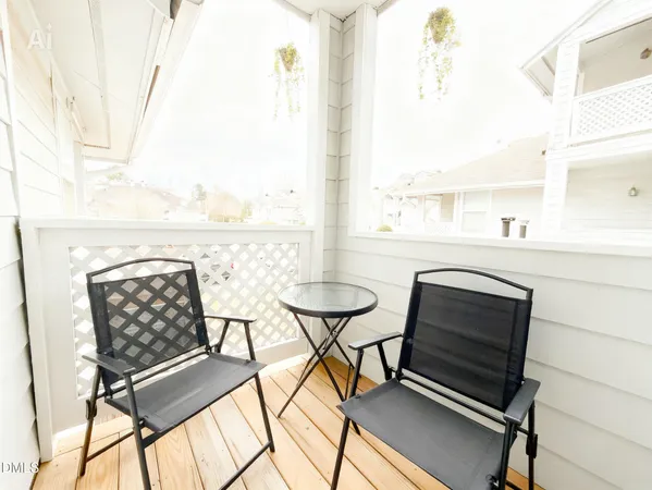 a white toilet sitting next to a bath tub and shower