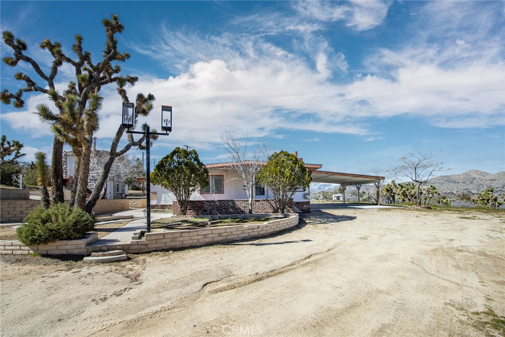 a view of a bench in front of a building