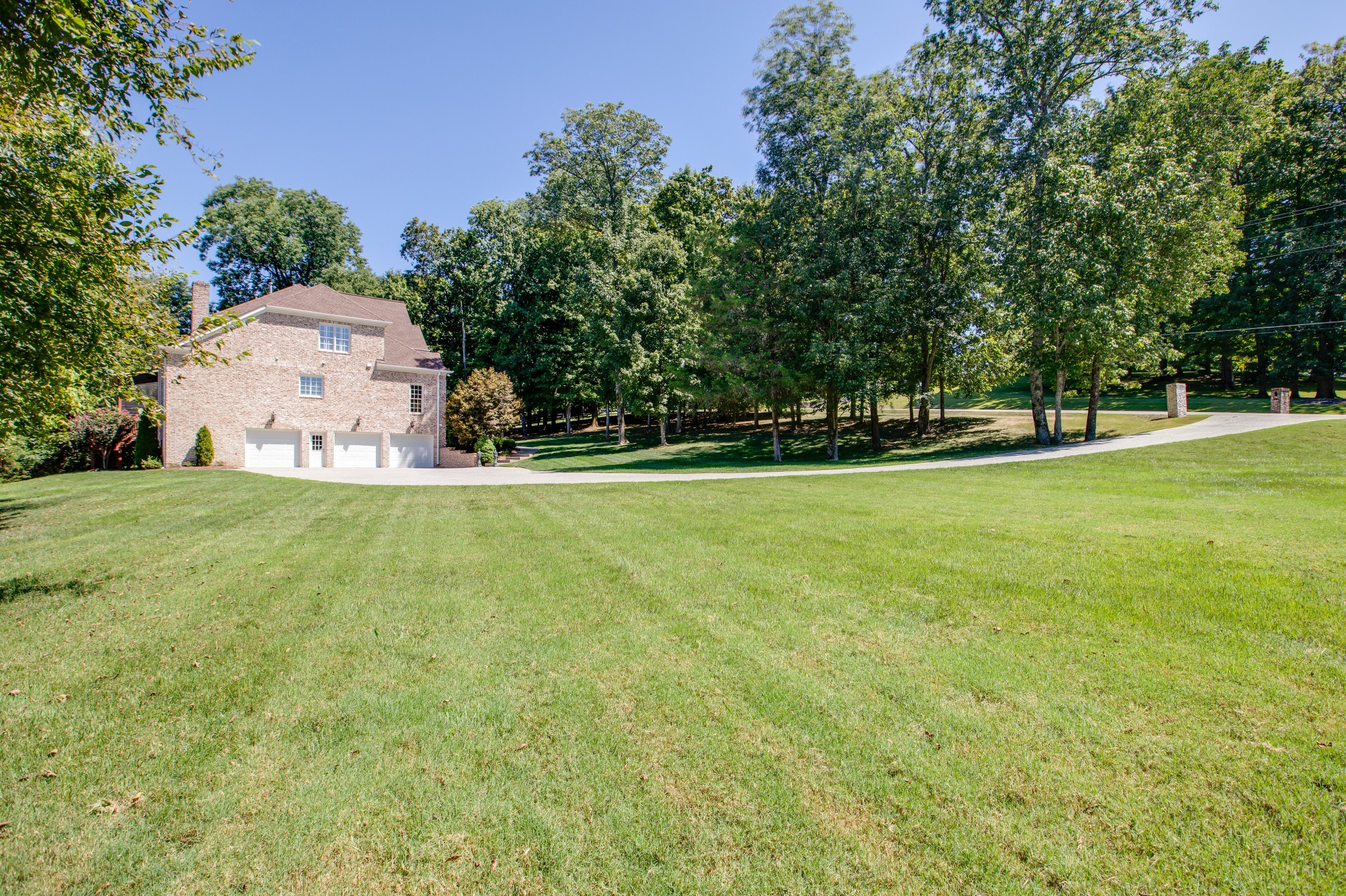 1106 Cedarview Lane Franklin, TN 37067 - Photo 21 of 28 a view of a field of grass and trees