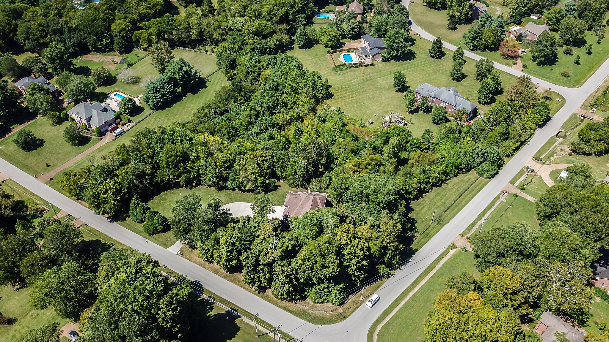 1106 Cedarview Lane Franklin, TN 37067 - Photo 27 of 28 a view of a garden with a building