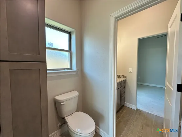 a bathroom with a toilet