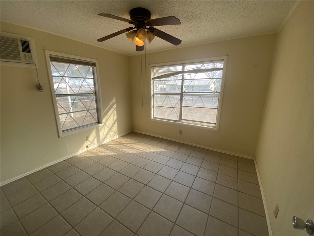 1015 Louis Street Alice, TX 78332 - Photo 16 of 20 a view of an empty room and window
