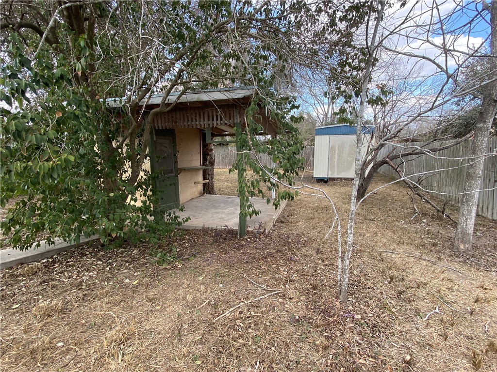 1015 Louis Street Alice, TX 78332 - Photo 20 of 20 a front view of a house with garden