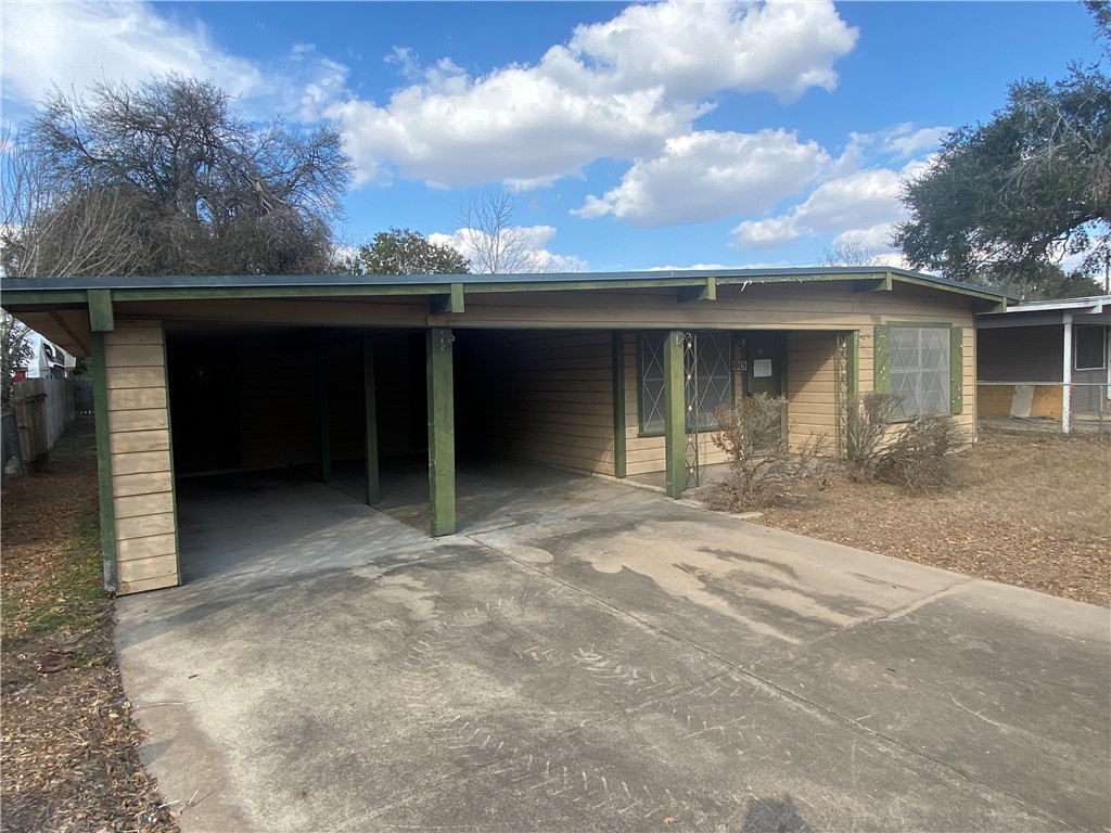 1015 Louis Street Alice, TX 78332 - Photo 3 of 20 front view of a house with a yard