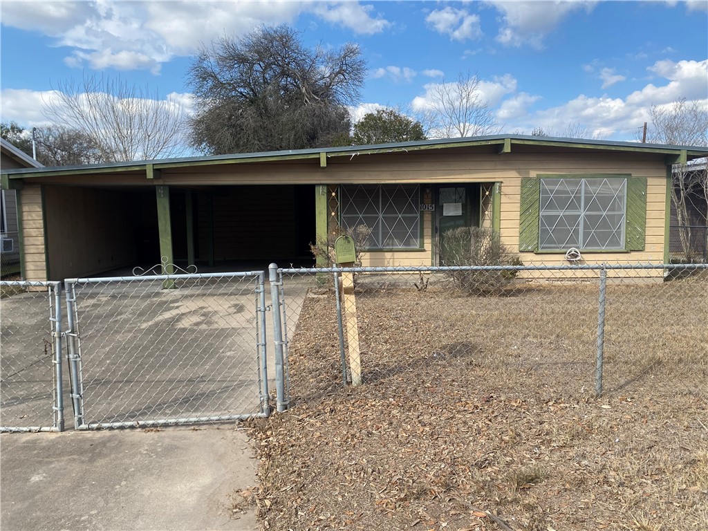 1015 Louis Street Alice, TX 78332 - Photo 5 of 20 a backyard of a house with table and chairs