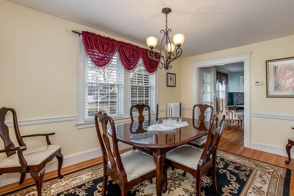 409 Mt Vernon Street Dedham, MA 02026 - Photo 15 of 42 a view of a dining room with furniture window and wooden floor