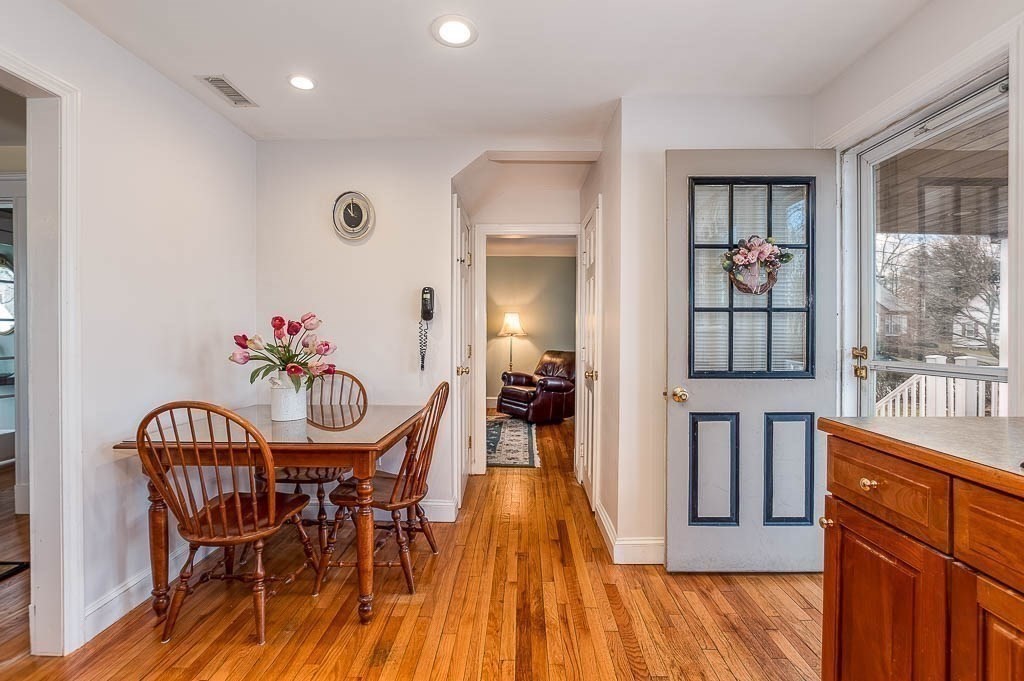 409 Mt Vernon Street Dedham, MA 02026 - Photo 19 of 42 a view of a dining room with furniture and wooden floor