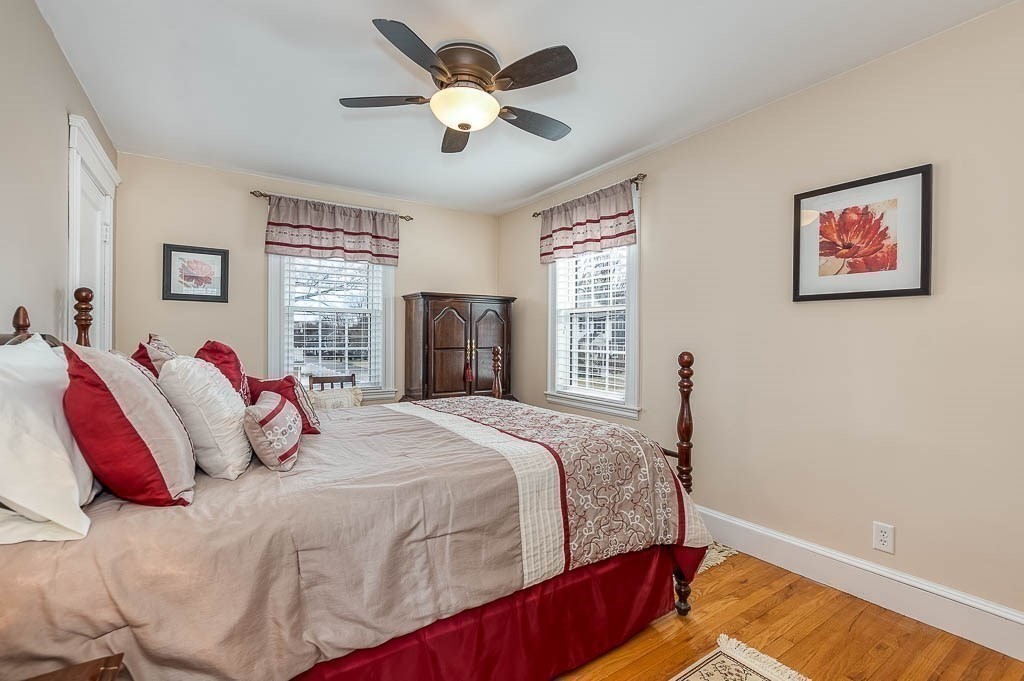 409 Mt Vernon Street Dedham, MA 02026 - Photo 24 of 42 a bedroom with a bed and a window