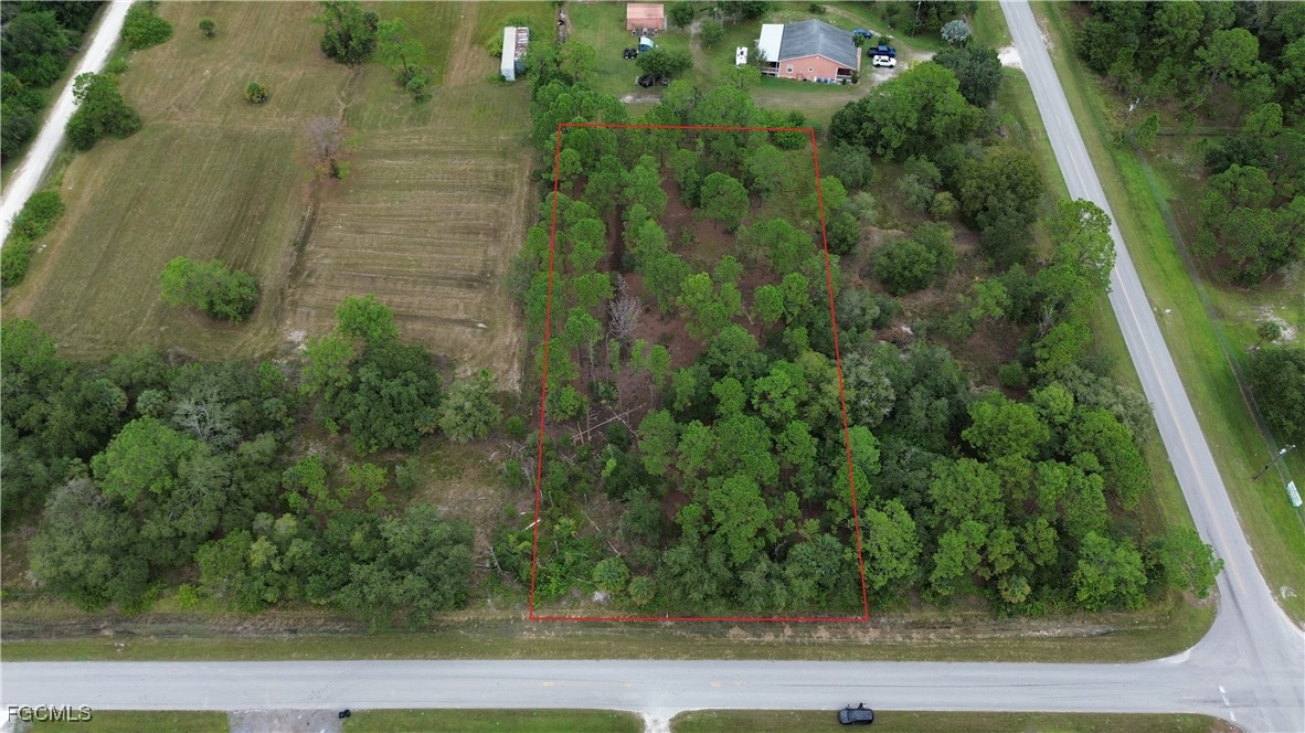 287 Avenida Del Sur Clewiston, FL 33440 - Photo 4 of 16 an aerial view of a residential houses with yard