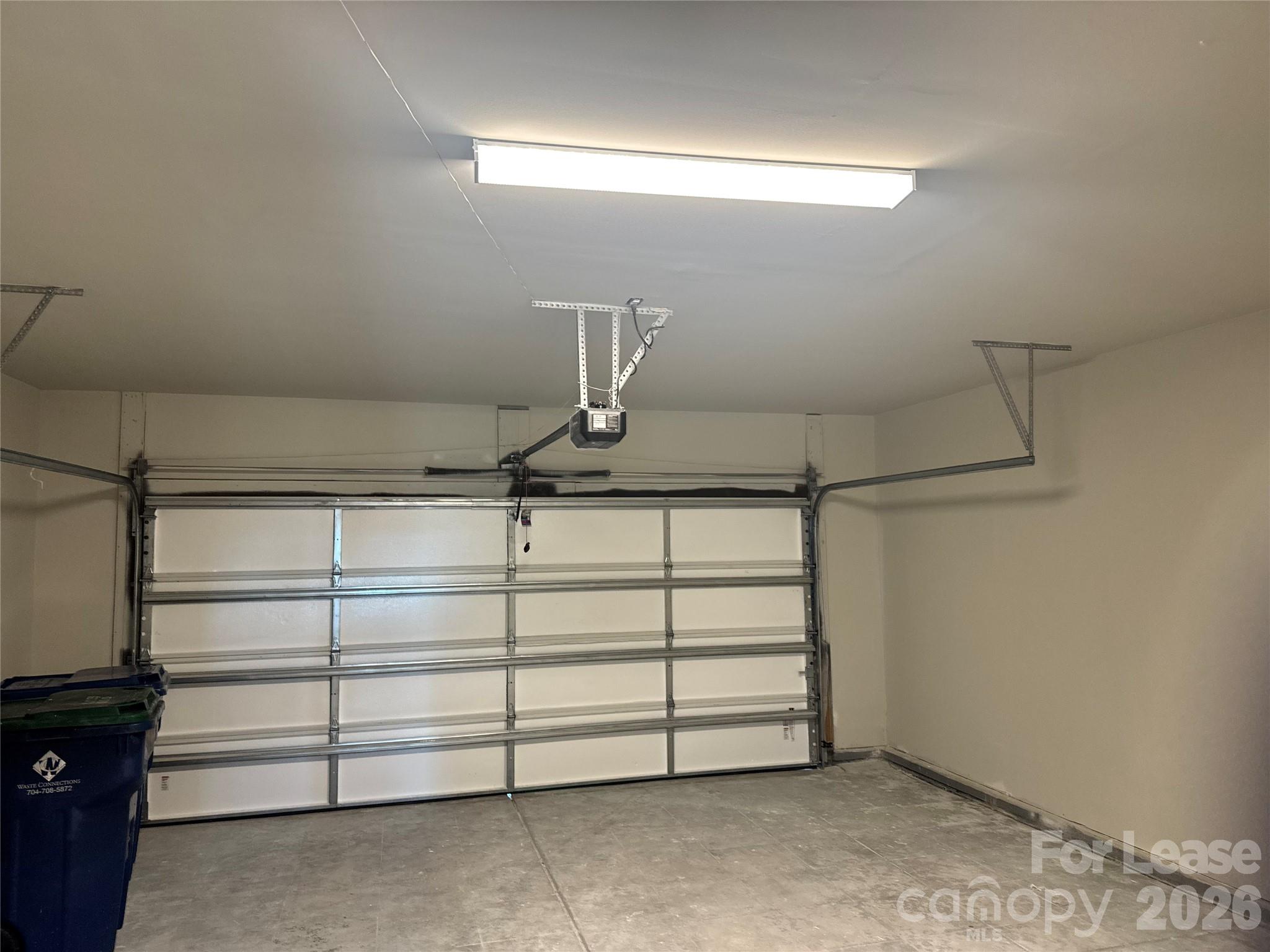 1007 Maylen Trace Monroe, NC 28110 - Photo 30 of 34 a view of a room with racks on the wall