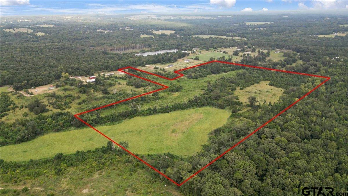 Tbd South Mimosa Road Gilmer, TX 75644 - Photo 4 of 13 an aerial view of residential houses with outdoor space
