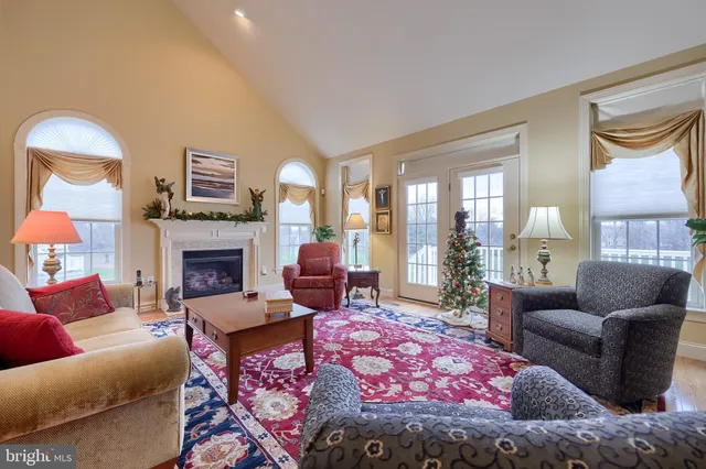 a living room with furniture and a table