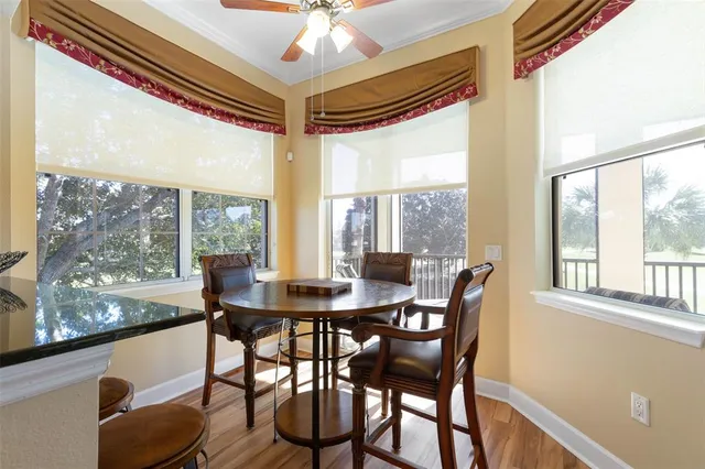 an aerial view of a house with a garden and swimming pool