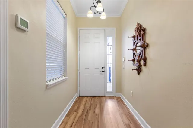 a kitchen with granite countertop stainless steel appliances and wooden cabinets