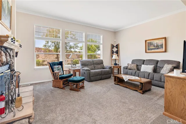 a view of a livingroom with furniture and window