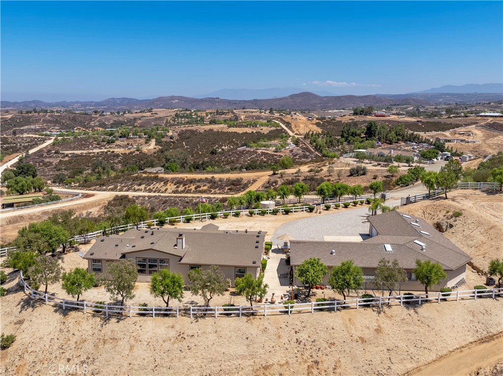39597 Calle Escalona Temecula, CA 92592 - Photo 2 of 61 an aerial view of residential houses with outdoor space