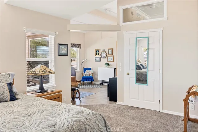 a bathroom with a sink a mirror and a bathtub