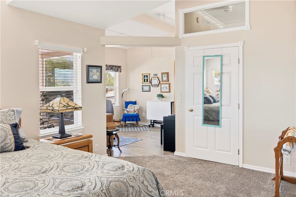 39597 Calle Escalona Temecula, CA 92592 - Photo 27 of 61 a bedroom with a bed and furniture