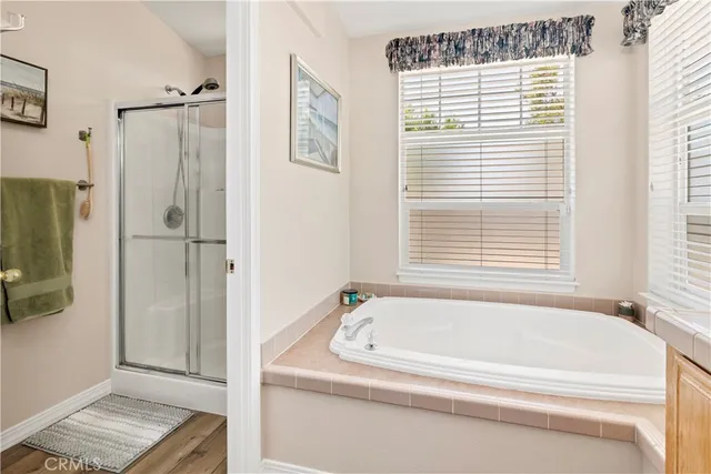 a view of a patio with couches and potted plants